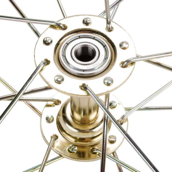 A close-up of a metal wheel with a metal hub.