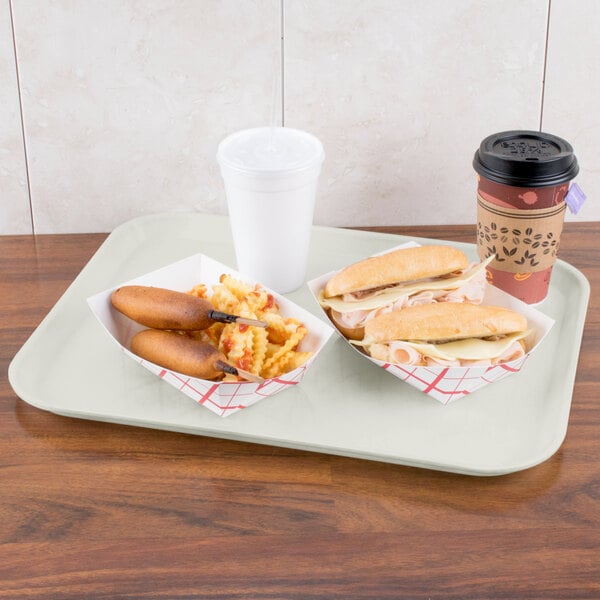 A Carlisle Glasteel tray with a hot dog, sandwich, coffee, and a drink on it.