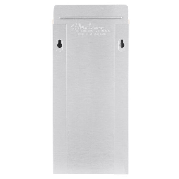 An Edlund stainless steel knife rack with a tan rectangular insert with holes.