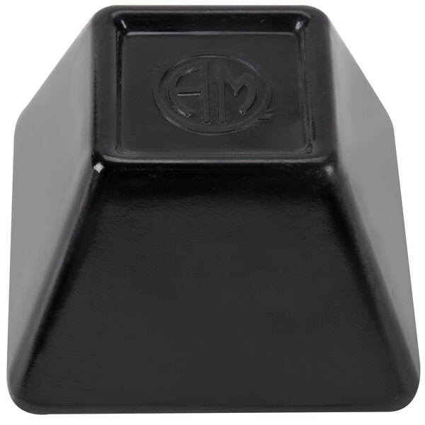 A black square American Metalcraft sauce cup with a circular logo.