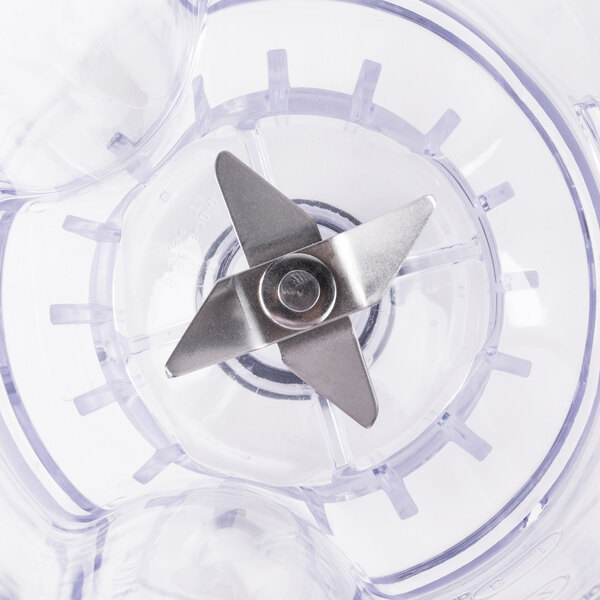 A Proctor Silex blender with a metal blade inside.