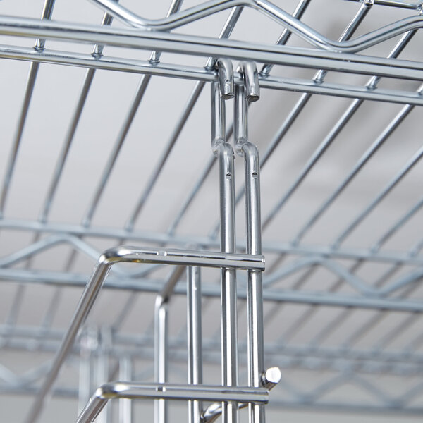 A chrome Metro tray slide with metal bars.