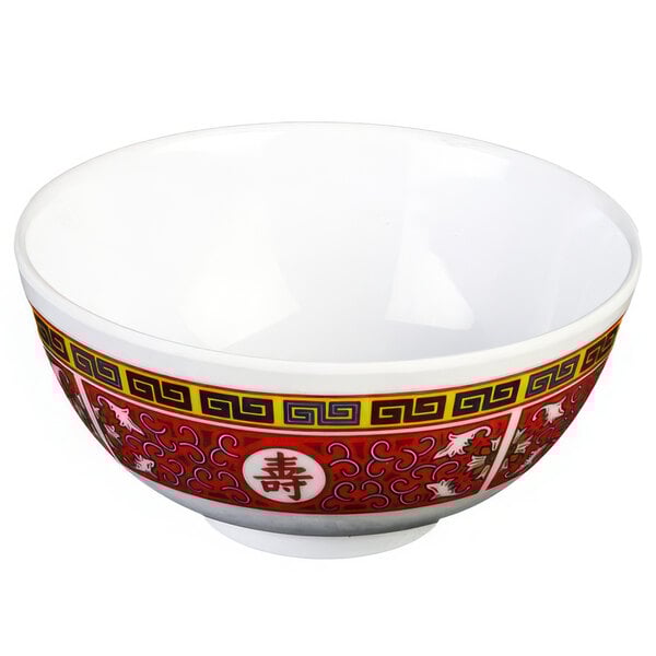 A white Thunder Group Longevity melamine rice bowl with a red and yellow oriental design.