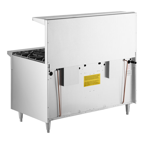 A large commercial stainless steel 10-burner range with two ovens and a raised back panel.