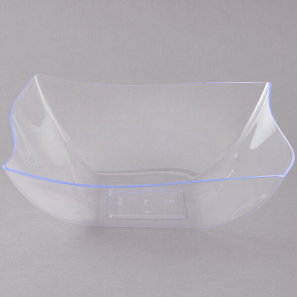 A clear plastic Fineline serving bowl.