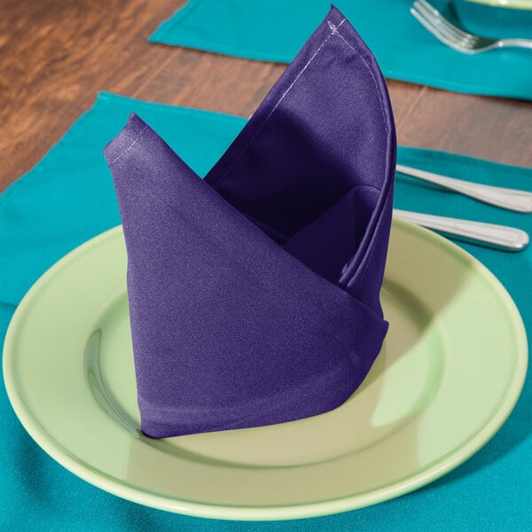 a napkin folded on a plate