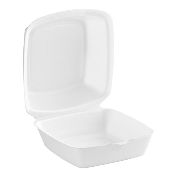A Dart white styrofoam container with a hinged lid.