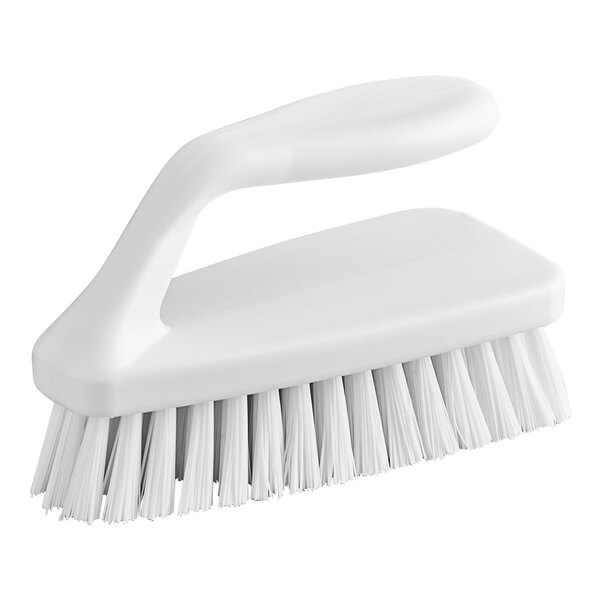 A close-up of a white Carlisle Sparta hand scrub brush with a handle.