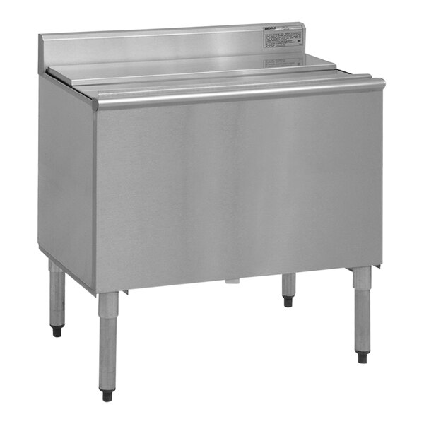 An Eagle Group stainless steel underbar ice chest with a door on top.