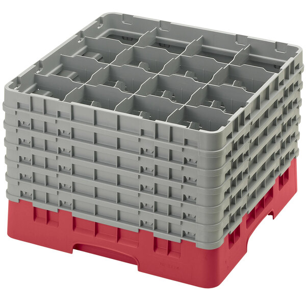 A red and gray Cambro plastic glass rack with 16 compartments and 6 extenders.