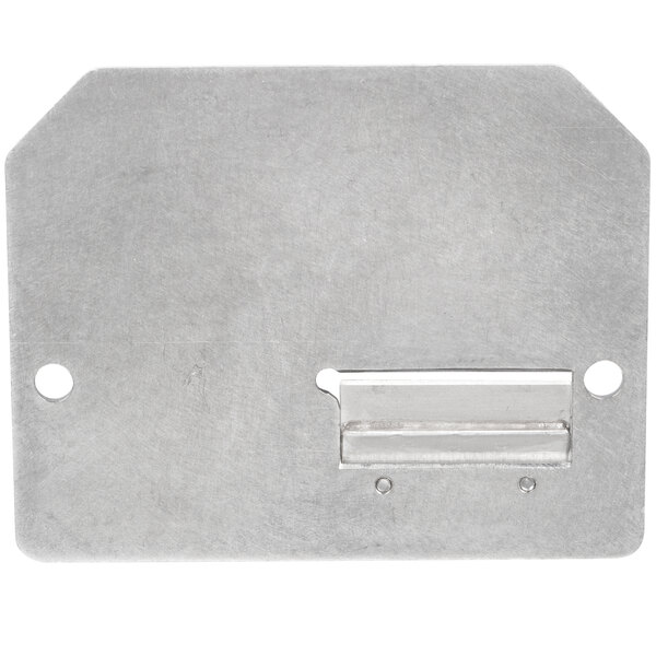 A metal plate with a hole in the middle.