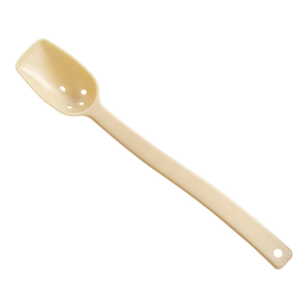 A beige plastic Cambro spoon with holes in the bowl.