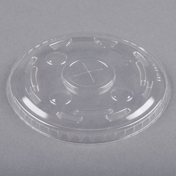 A clear plastic lid with a straw slot.