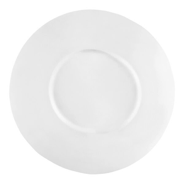 A CAC Paris white porcelain plate with a wide rim.