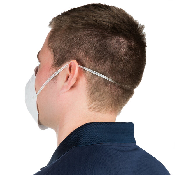 A man wearing a Cordova general purpose nuisance dust mask.