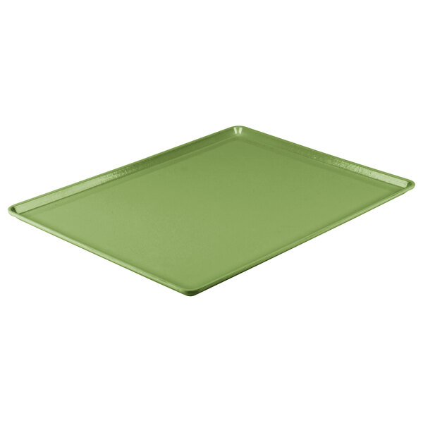 A lime green Cambro dietary tray with a rectangular shape.