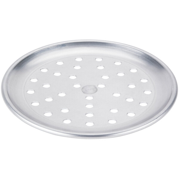 An American Metalcraft round silver aluminum pizza pan with holes.