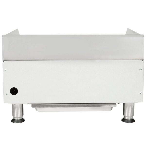 An APW Wyott electric countertop griddle with a white surface and black legs.