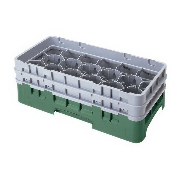 A green and white plastic Cambro glass rack with 17 compartments and 6 extenders.