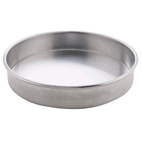 An American Metalcraft tin-plated steel pizza pan with straight sides.