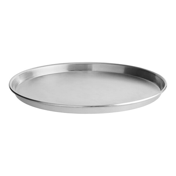 A round, standard weight aluminum pizza pan with a slightly raised edge.