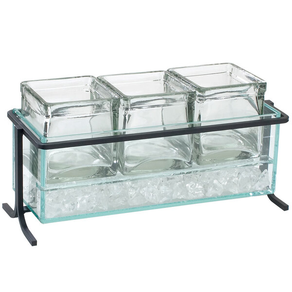 A black metal display with three glass jars holding ice cubes.