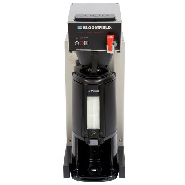 A black Bloomfield automatic coffee brewer with touchpad controls.
