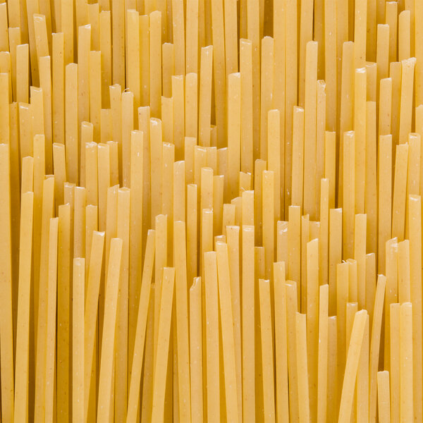 Close up of dried long, flat pasta