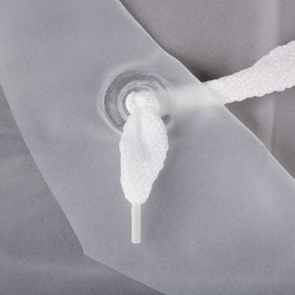 A clear San Jamar dishwasher apron in a clear plastic bag with a white plastic hook.