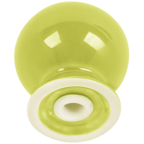 a close-up of a yellow glass bowl