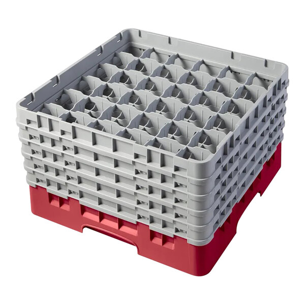 A red and gray Cambro glass rack with 36 compartments and five extenders for washing and storing glassware.