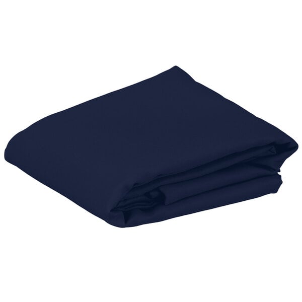 A folded navy blue Intedge rectangular table cover.