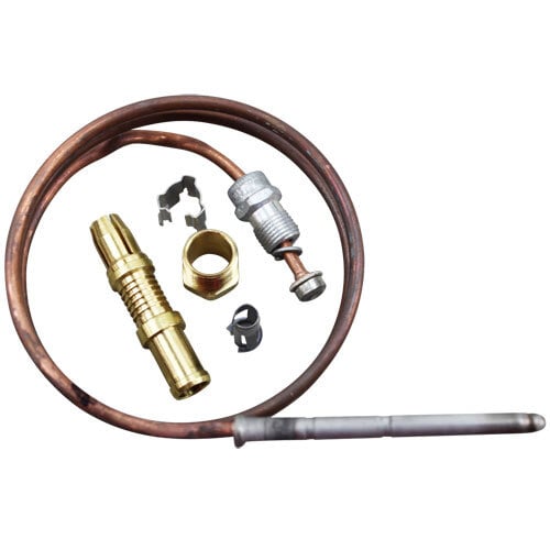 A copper pipe with brass fittings and a gold metal tip.