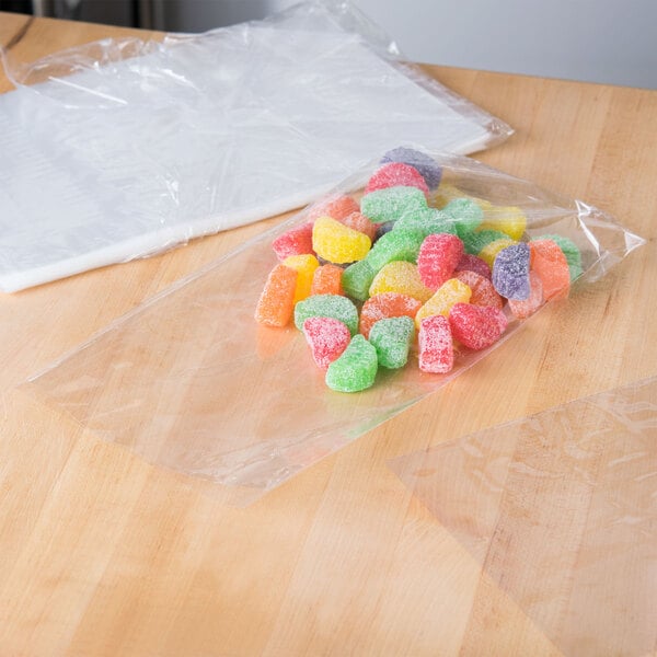 A plastic bag of gummy candies on a table.