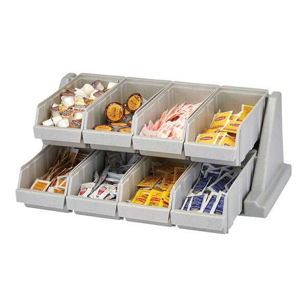 A Cambro Versa self-serve condiment bin stand with gray plastic condiment bins on a 2-tier stand.