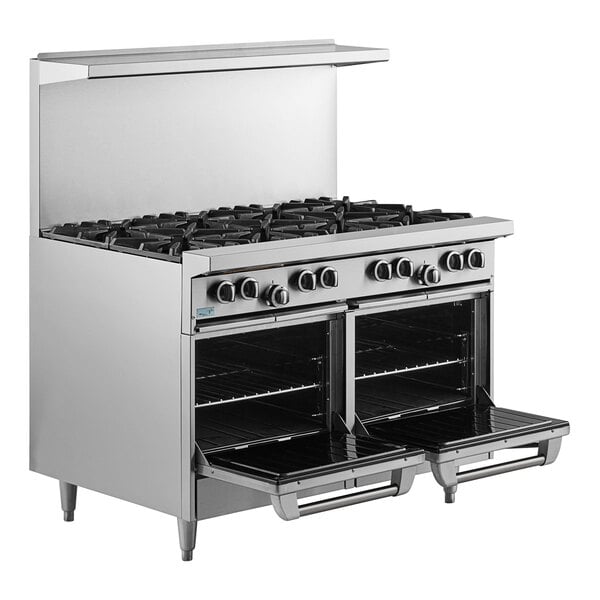 A large stainless steel Garland range with black knobs.