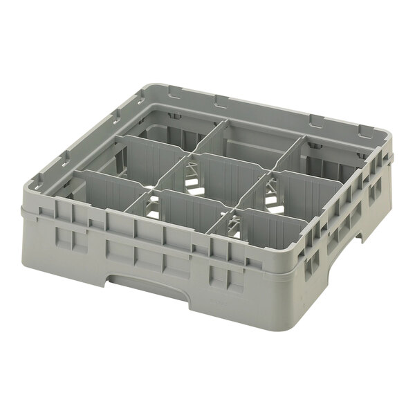 A soft gray plastic Cambro glass rack with nine compartments.