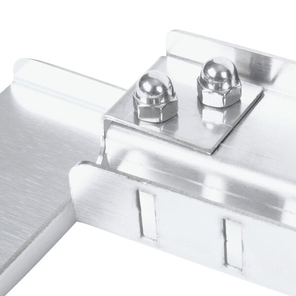 A metal bracket with two nuts attached.