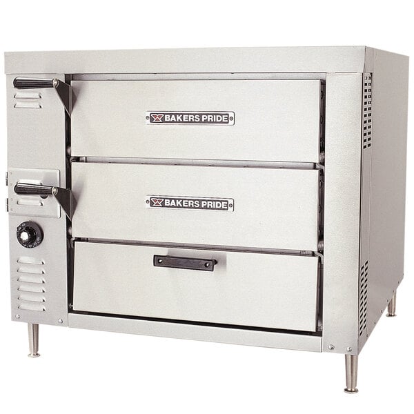 A stainless steel Bakers Pride countertop oven with two drawers.