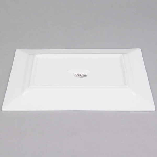 A white rectangular Arcoroc porcelain platter.