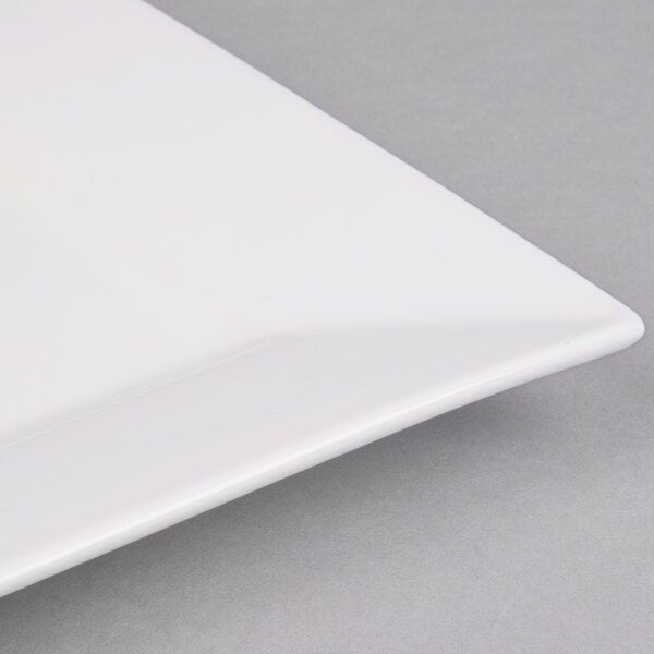 A white rectangular porcelain platter with a white rim.