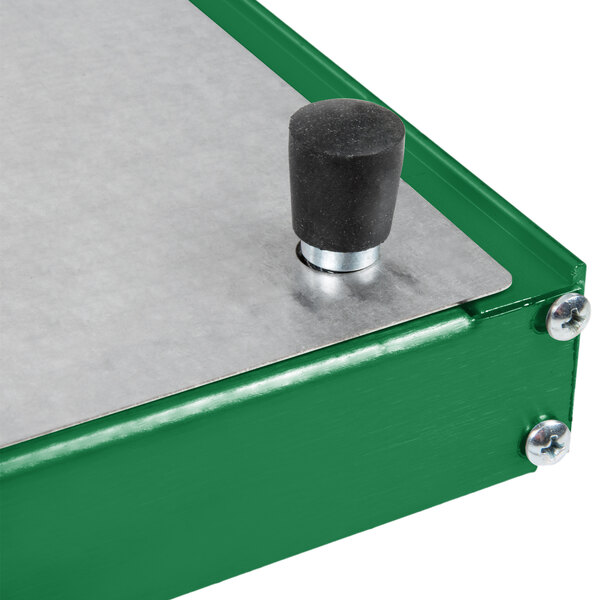 A green and silver Hatco Glo-Ray heated shelf warmer with a black knob.