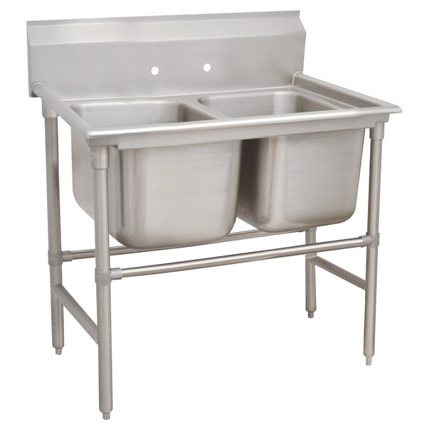 A stainless steel Advance Tabco two-compartment pot sink with two sinks.