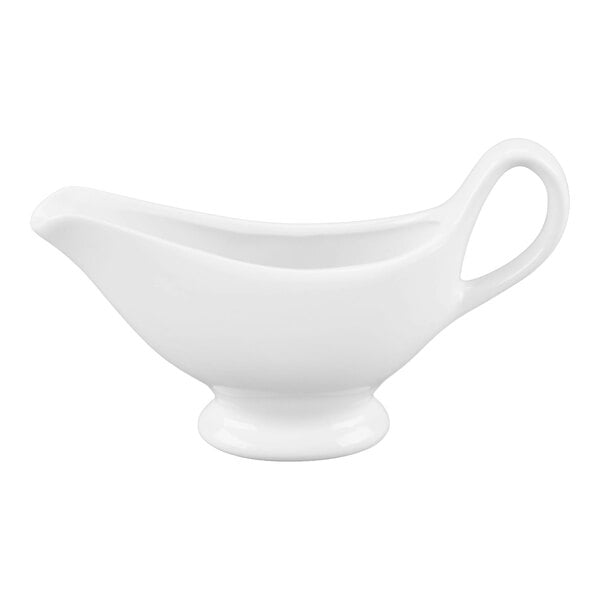 A white porcelain gravy boat with a handle and a spout, shown against a plain background.