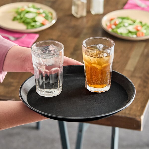 Cambro 1100CT110 Camtread® 11" Round Black Non-Skid Serving Tray - 12/Case