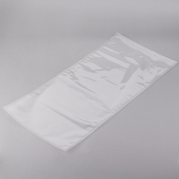 An ARY VacMaster clear plastic vacuum packaging bag on a white surface.