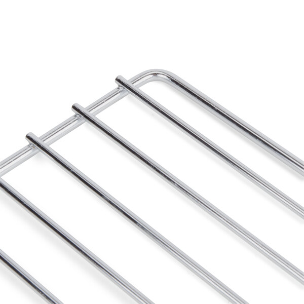 A stainless steel replacement rack for a countertop pizza oven with four metal bars.