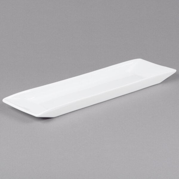 A white rectangular porcelain platter with a long edge.