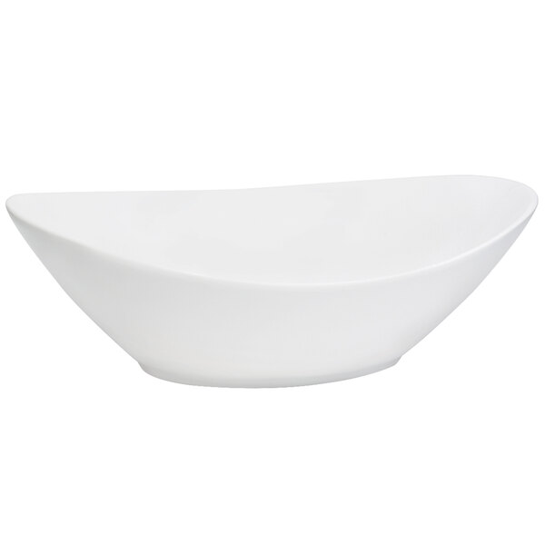 A white Cal-Mil porcelain oval bowl.