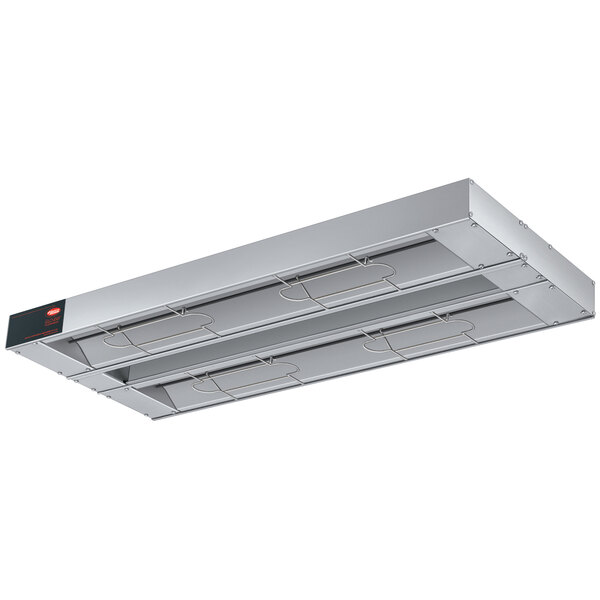 A rectangular metal Hatco strip warmer with a black label.